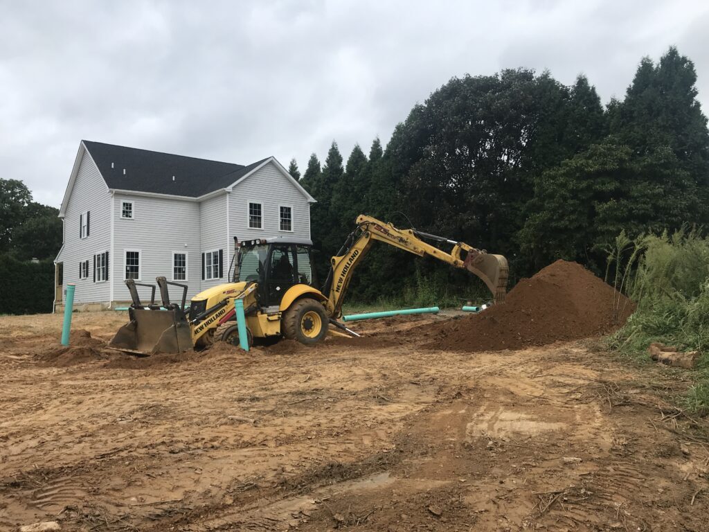 Sanitary sewer installation during site construction