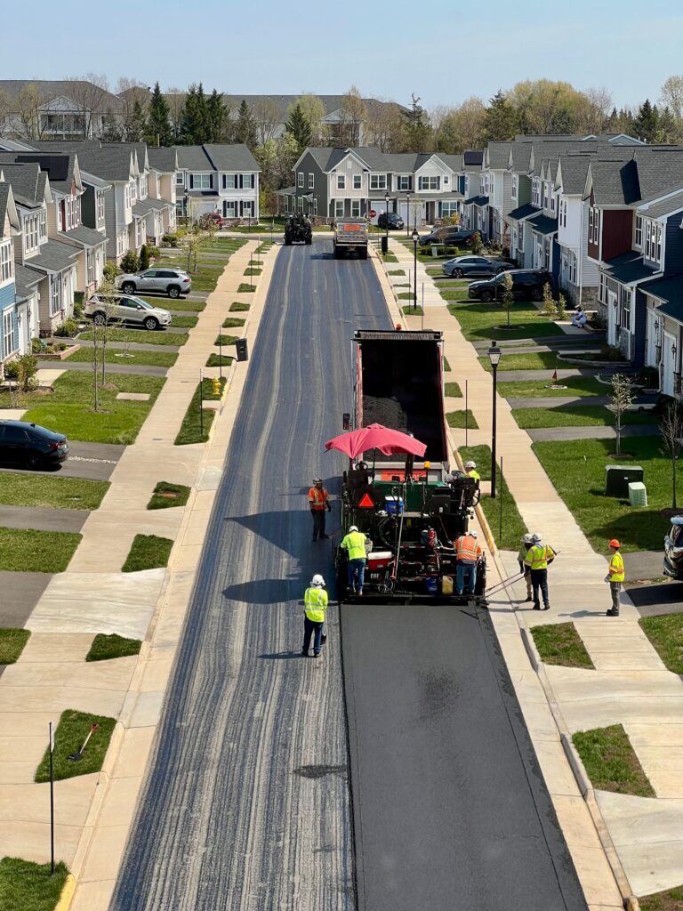 Paving crew working in a new development